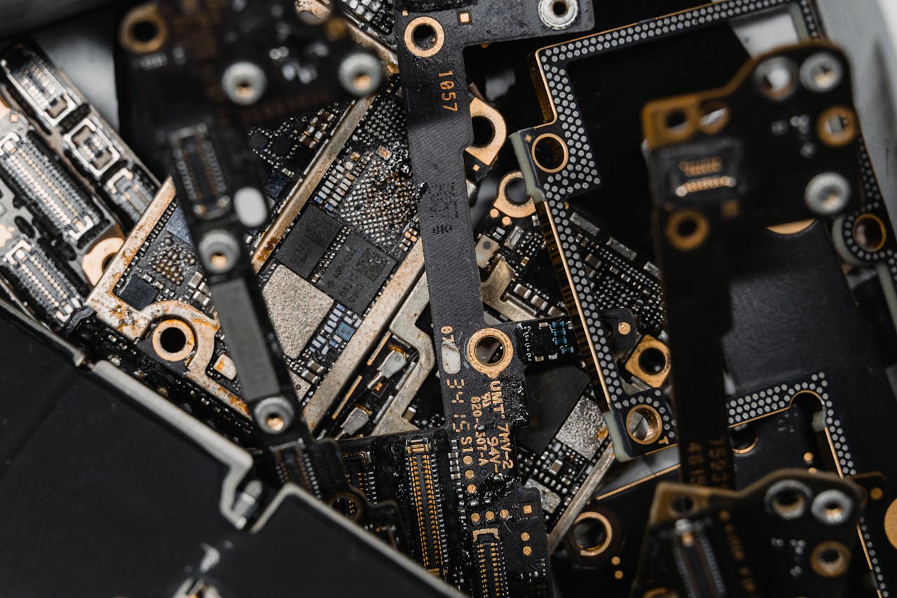 our-story A detailed close-up of assorted electronic circuit board components.